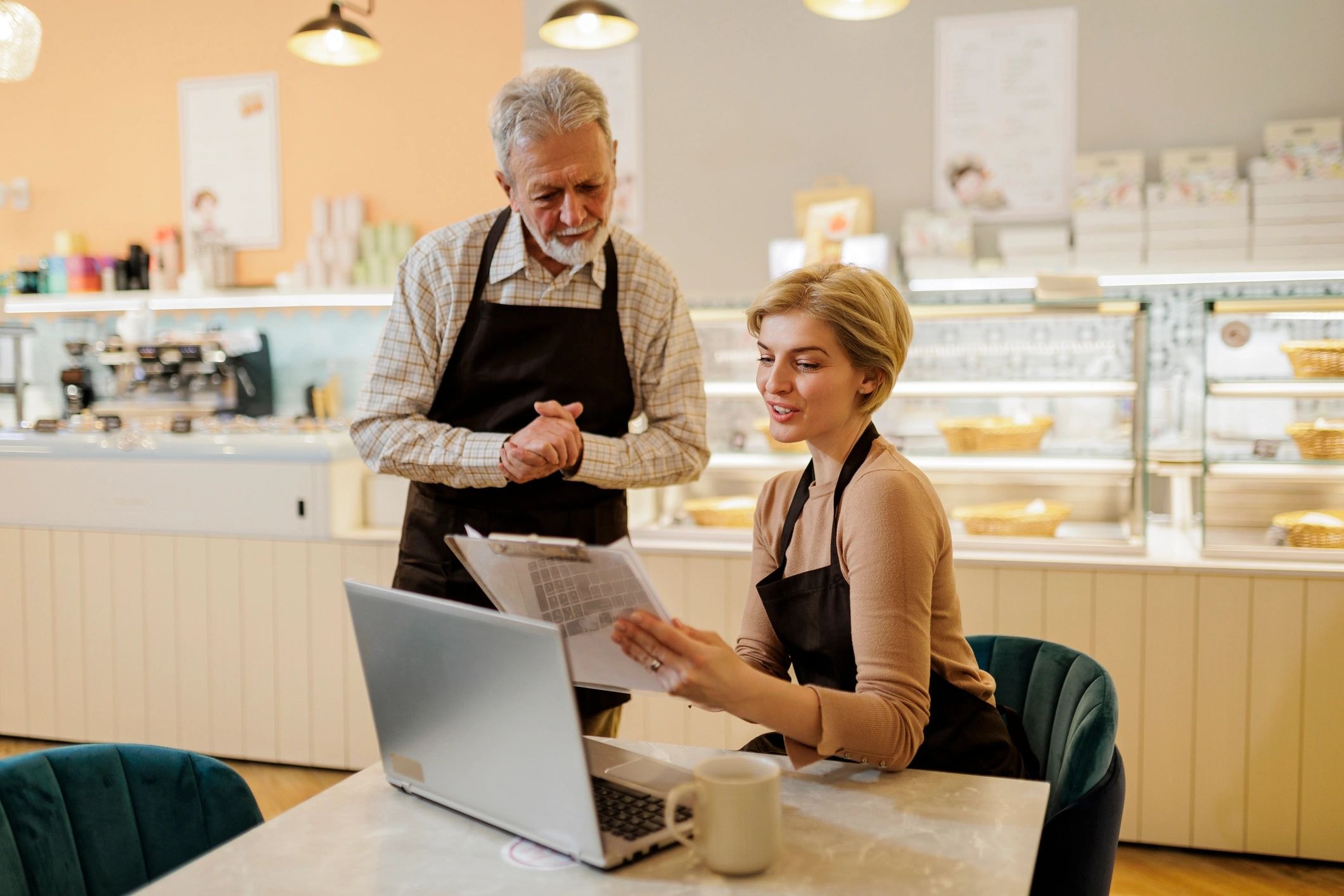 Restaurant operator and business owner collaborating